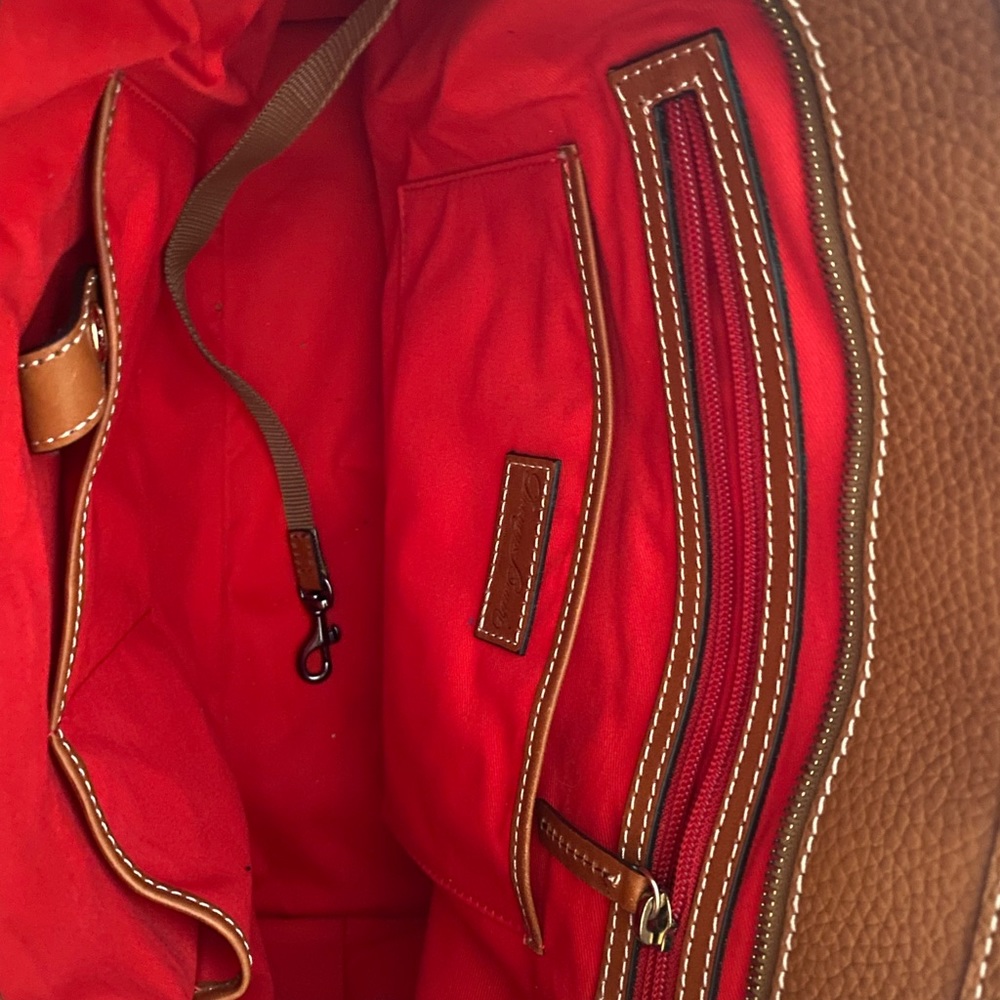 Like new Dooney and Bourke copper colored handbag.